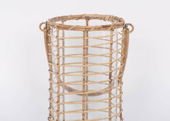 Lieto Lantern, second view, the rattan lantern with its handle and glass sleeve on a white background.
