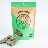 Green and brown package of 'Winnie the Canine' mints with a dog bone on a white background