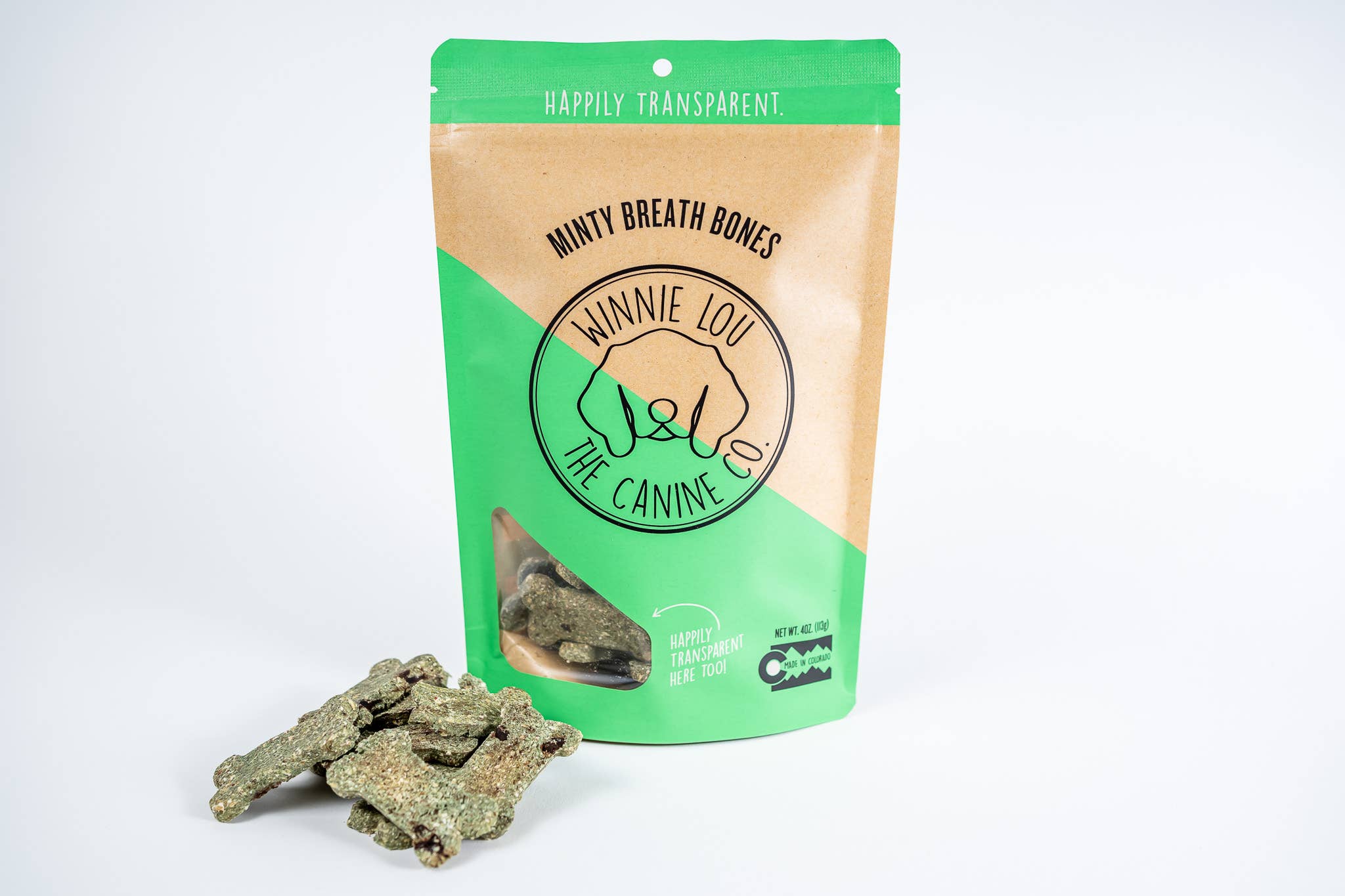 Green and brown package of 'Winnie the Canine' mints with a dog bone on a white background