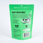 Green package of 'Minty Breath Bones' from Winnie Lou on a white background