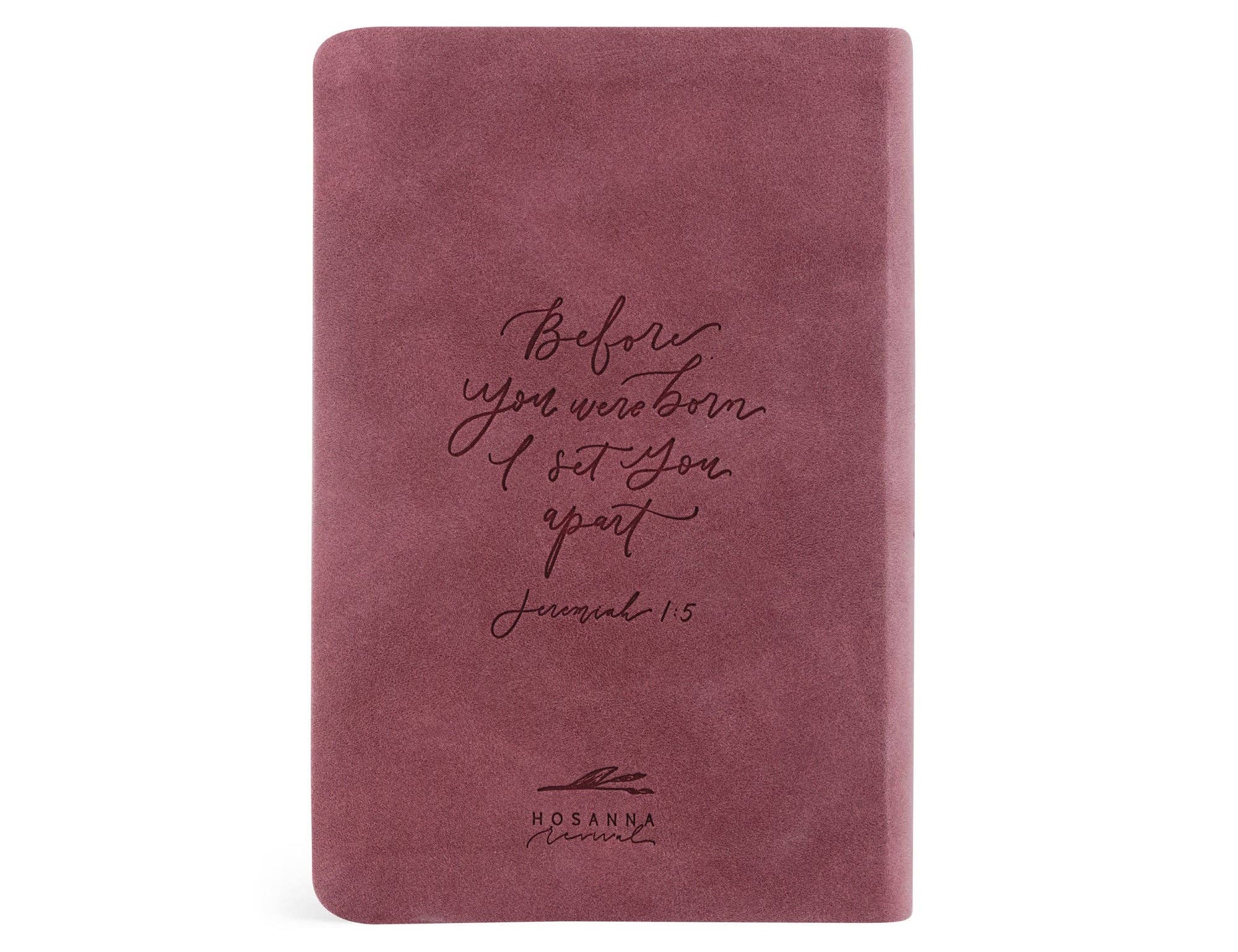 Mauve notebook with text and branding on a white background