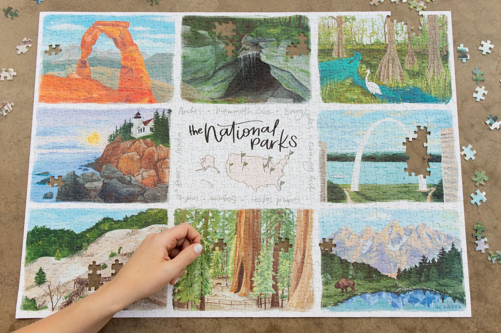 The National Parks 1000 Piece Puzzle Discover beautifully illustrated scenes from Arches, Mammoth Cave, Everglades, Acadia, Gateway Arch, Indiana Dunes, Sequoia, and Grand Tetons National Parks.