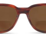 Sunglasses with tortoiseshell frame and brown lenses on a white background