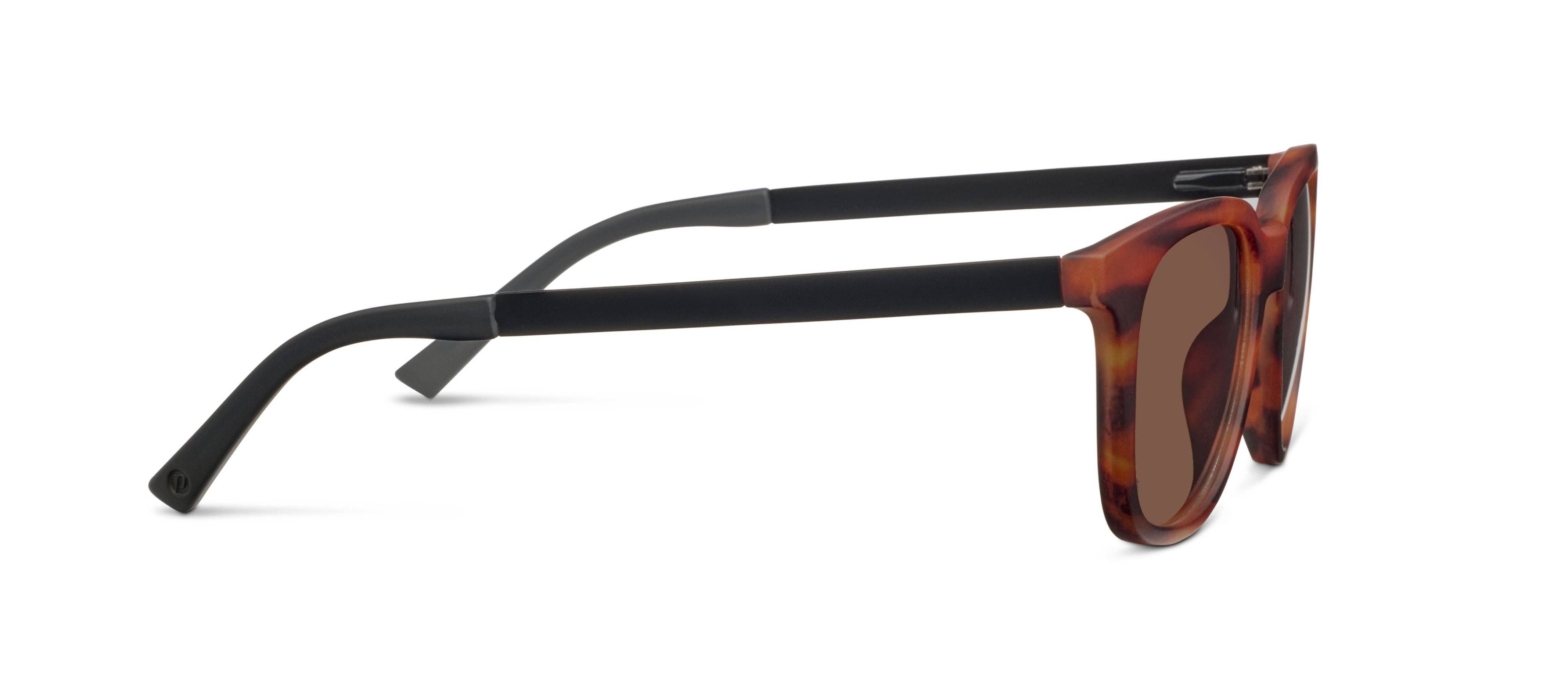 Sunglasses with tortoiseshell frame and brown lenses on a white background