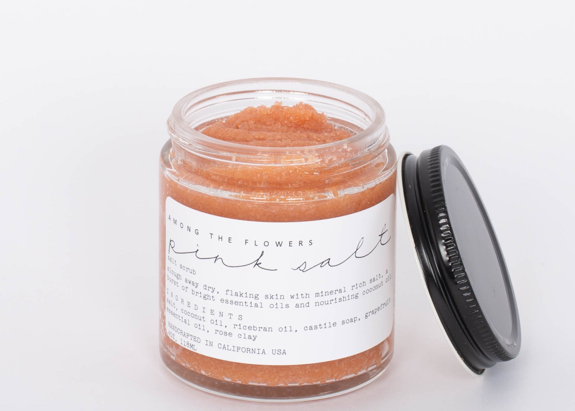 Pink Salt Moisturizing Whipped Salt Scrub. A whipped salt, coconut oil, and castile soap scrub infused with essential oils and botanical extracts for absorption and added nutrients. Our soap base cleans while rich coconut oil moisturizes, and salt sloughs away dead skin.