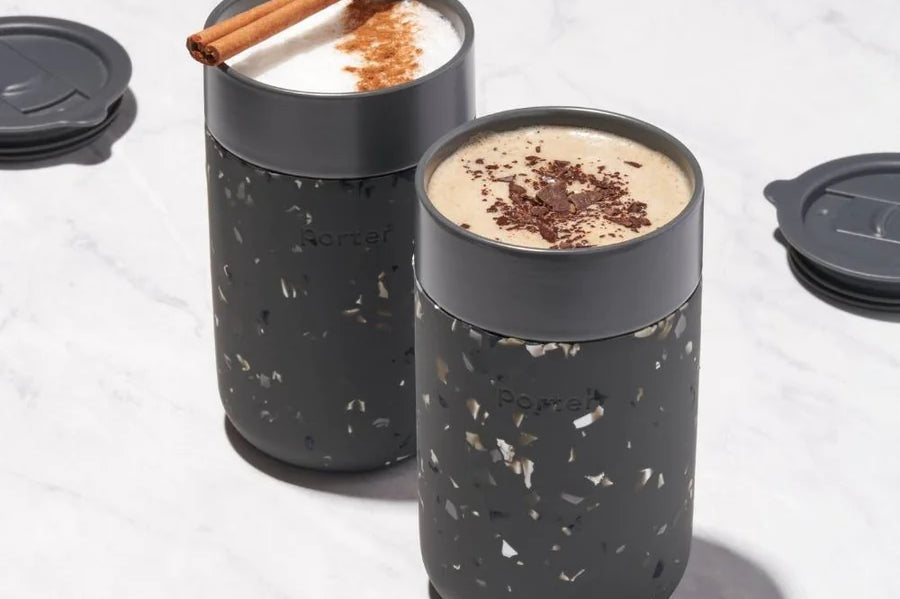 Charcoal Terrazzo. Porter Mug. Silicone sleeve is grippable, soft on the hands, and prevents scratches on surface. Splash-resistant lid. Microwave & dishwasher safe.