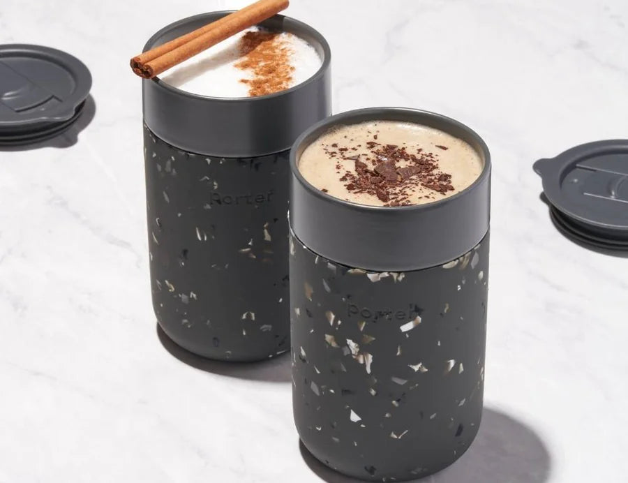 Charcoal Terrazzo. Porter Mug. Silicone sleeve is grippable, soft on the hands, and prevents scratches on surface. Splash-resistant lid. Microwave & dishwasher safe.