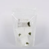 Pack of four pure Energy Eucalyptus + Peppermint Shower Steamers with essential oils by Cleanse Gourmet.