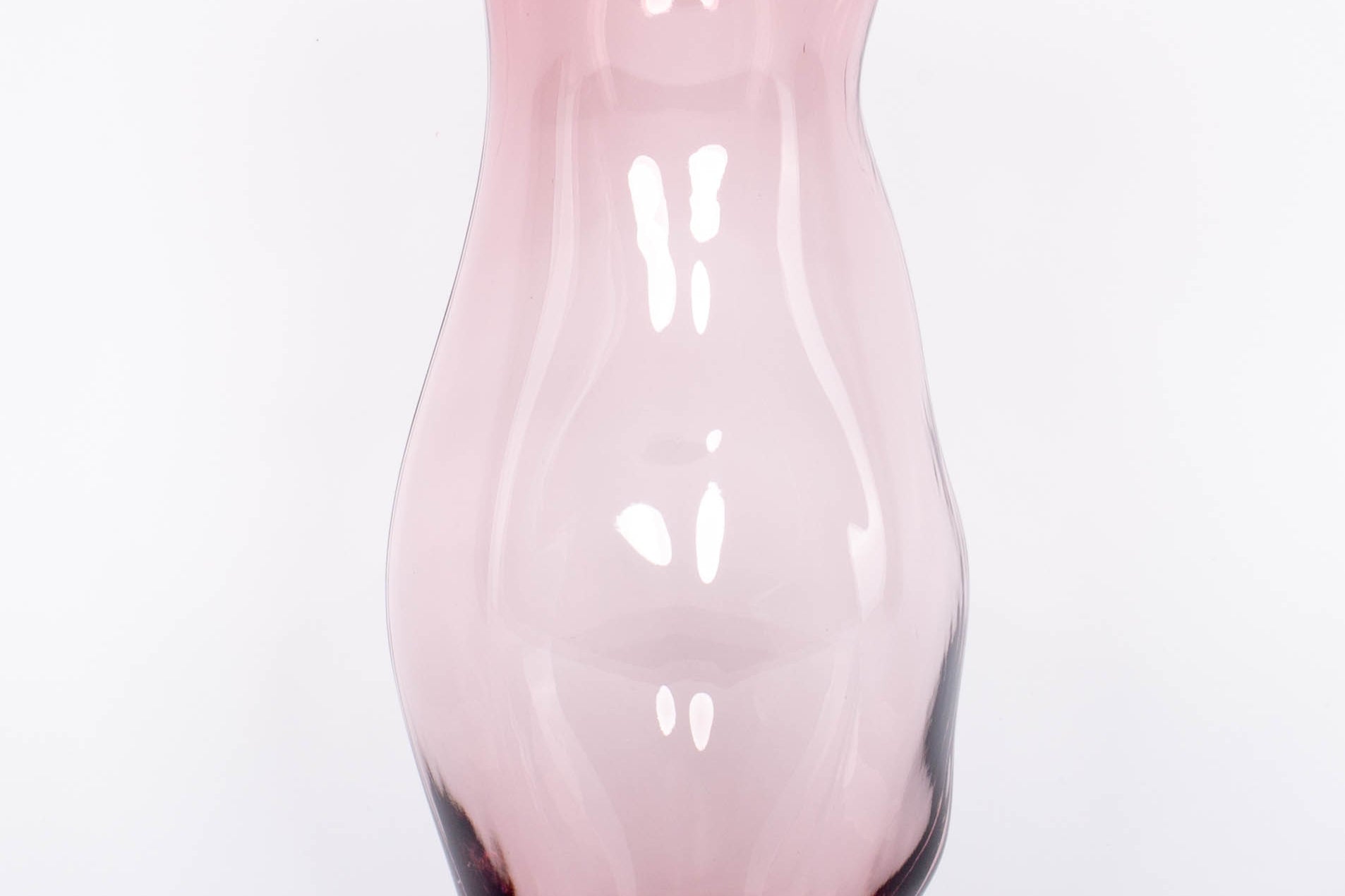 Minimal purple hued and mouth blown Onda Pitcher by Accent Decor.