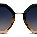 Sunglasses with a hexagonal frame and gradient lenses on a white background