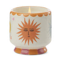 Hand painted sun and moon ceramic candle