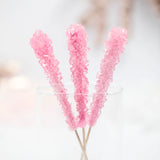 Three Nostalgic bubblegum flavored Think Pink Rock Candy by Lolli & Pops in clear class.