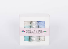 Box of TWEE Unicorn Narwhal Chalk. Three chalk pieces in silver and purple blue swirl colors. White background. 