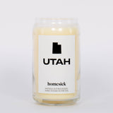Cream soy wax hand poured Utah Candle by Homesick in glass jar and label with Utah state outline. 
