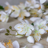 Abigail Ahern Artificial Cream Campanula, close-up of the white bell-shaped blossoms with yellow centers