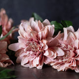 Abigail Ahern Artificial Dahlia Flamingo, close-up of two pink dahlia heads with green foliage