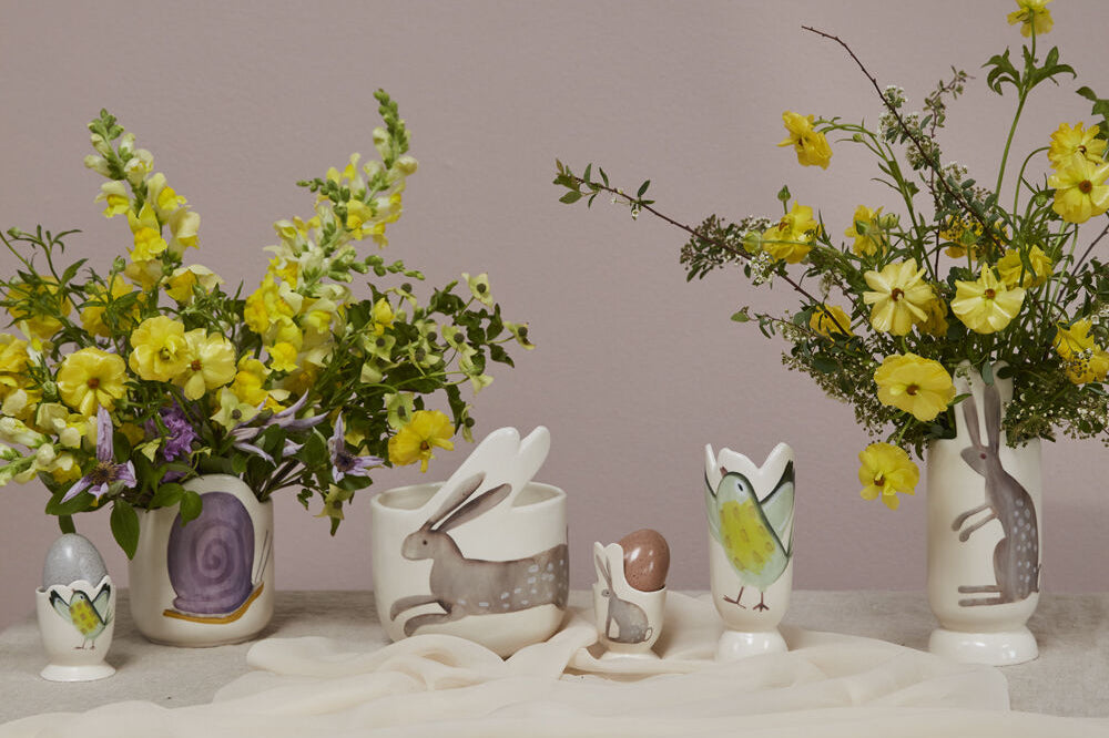 Celebrate Spring Egg Collection, third view, the ceramic egg cup with its bunny ear rim.