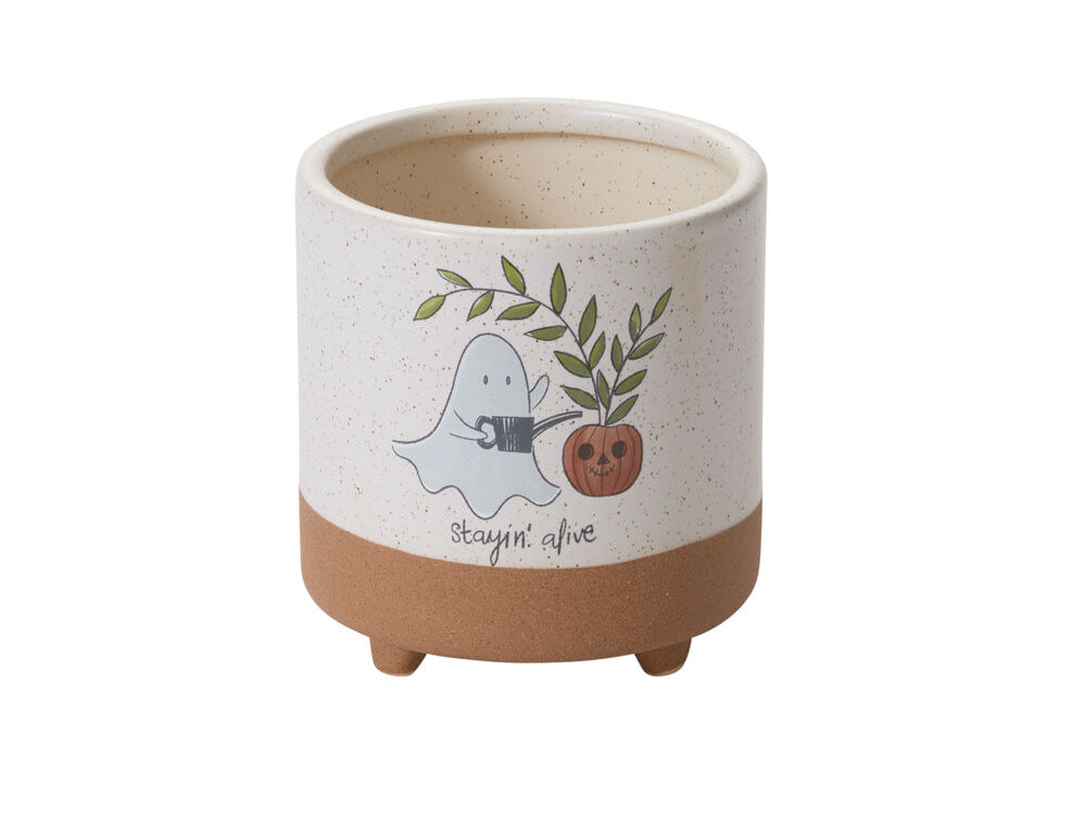 Optimistic Ghost Footed Pot, the footed ceramic planter with a speckled off white finish and a ghost decal.