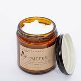 Among the Flowers Big Tree Bod Butter open jar showing the whipped white butter with the lid beside it