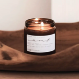 Among the Flowers Camp Candle lit inside a carved wooden bowl