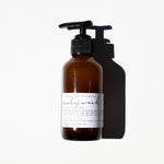 Among the Flowers Lavender Lullaby Baby Wash in an amber pump bottle