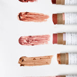 Among the Flowers Lip and Cheek Tint swatches in rose, berry, coral and nude shades