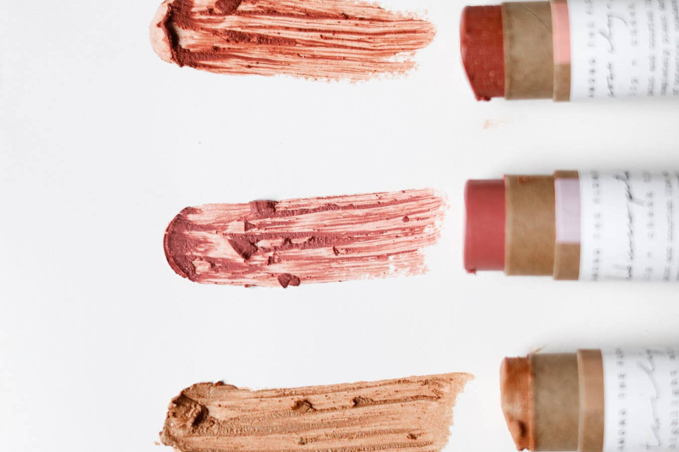 Among the Flowers Lip and Cheek Tint swatches in rose, berry, coral and nude shades