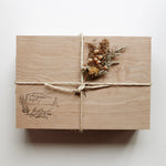 Among the Flowers New Mom + Babe Kit wooden box tied with twine and dried flowers