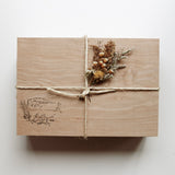 Among the Flowers New Mom + Babe Kit wooden box tied with twine and dried flowers