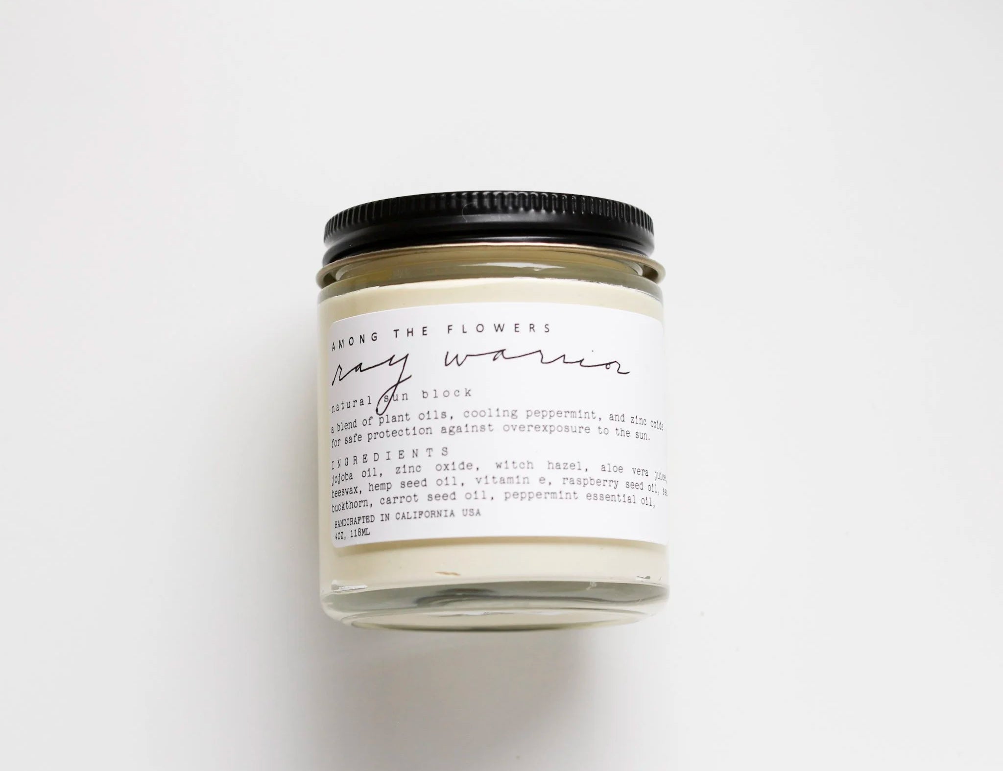Among the Flowers Ray Warrior Natural UV Shield in an amber glass jar with a black lid and white label