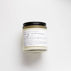 Among the Flowers Ray Warrior Natural UV Shield in an amber glass jar with a black lid and white label