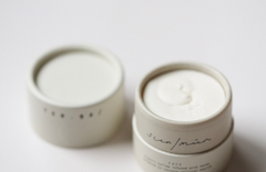 Among the Flowers Tallow Face Cream, two small white jars, one open showing the whipped cream