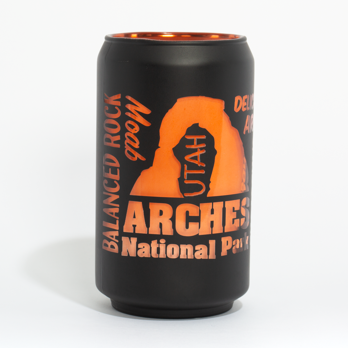 Matte black Arches National Park glass can with Delicate Arch and Balanced Rock in peach print