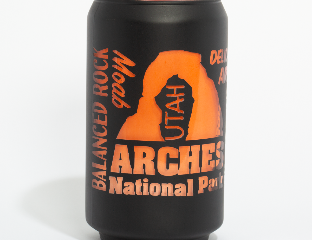 Matte black Arches National Park glass can with Delicate Arch and Balanced Rock in peach print
