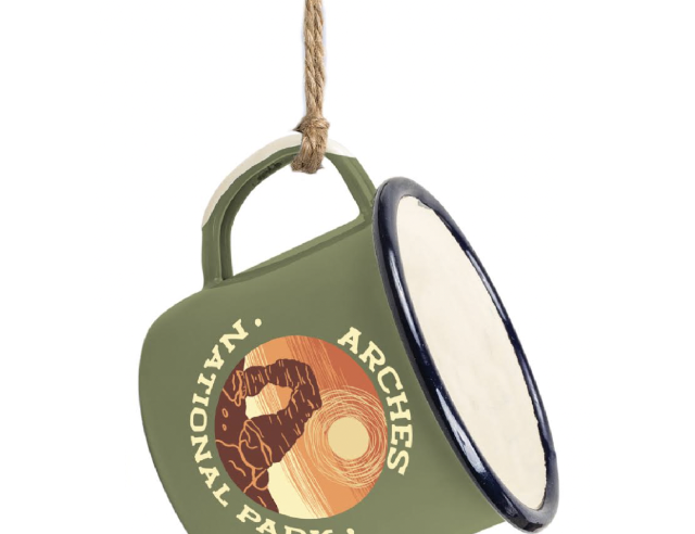 Miniature olive enamel camp mug ornament with an Arches National Park badge, hung on jute cord