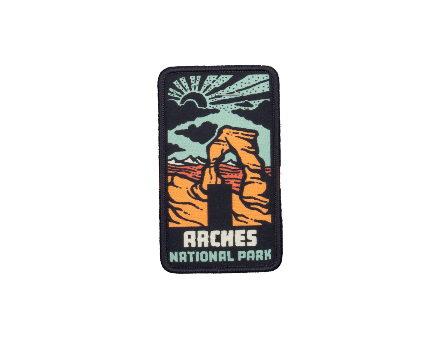 Arches National Park woven patch, Delicate Arch in orange and cream against a teal sky with a rising sun, ARCHES NATIONAL PARK lettered at the foot.