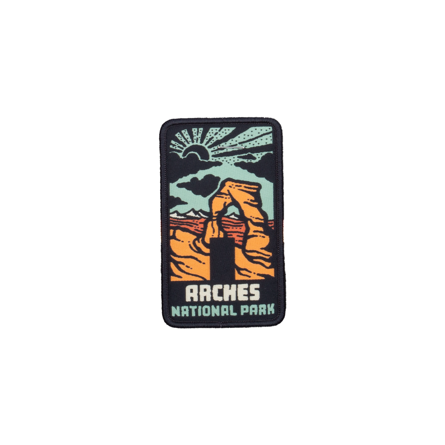 Arches National Park woven patch, Delicate Arch in orange and cream against a teal sky with a rising sun, ARCHES NATIONAL PARK lettered at the foot.