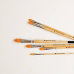 Bailey Rae Studio Filbert Watercolor Brushes arranged in a row showing the graduated sizes