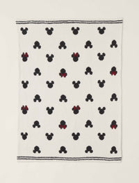 Barefoot Dreams Classic Disney Baby Blanket, a cream blanket with black Mickey and red-bow Minnie icons