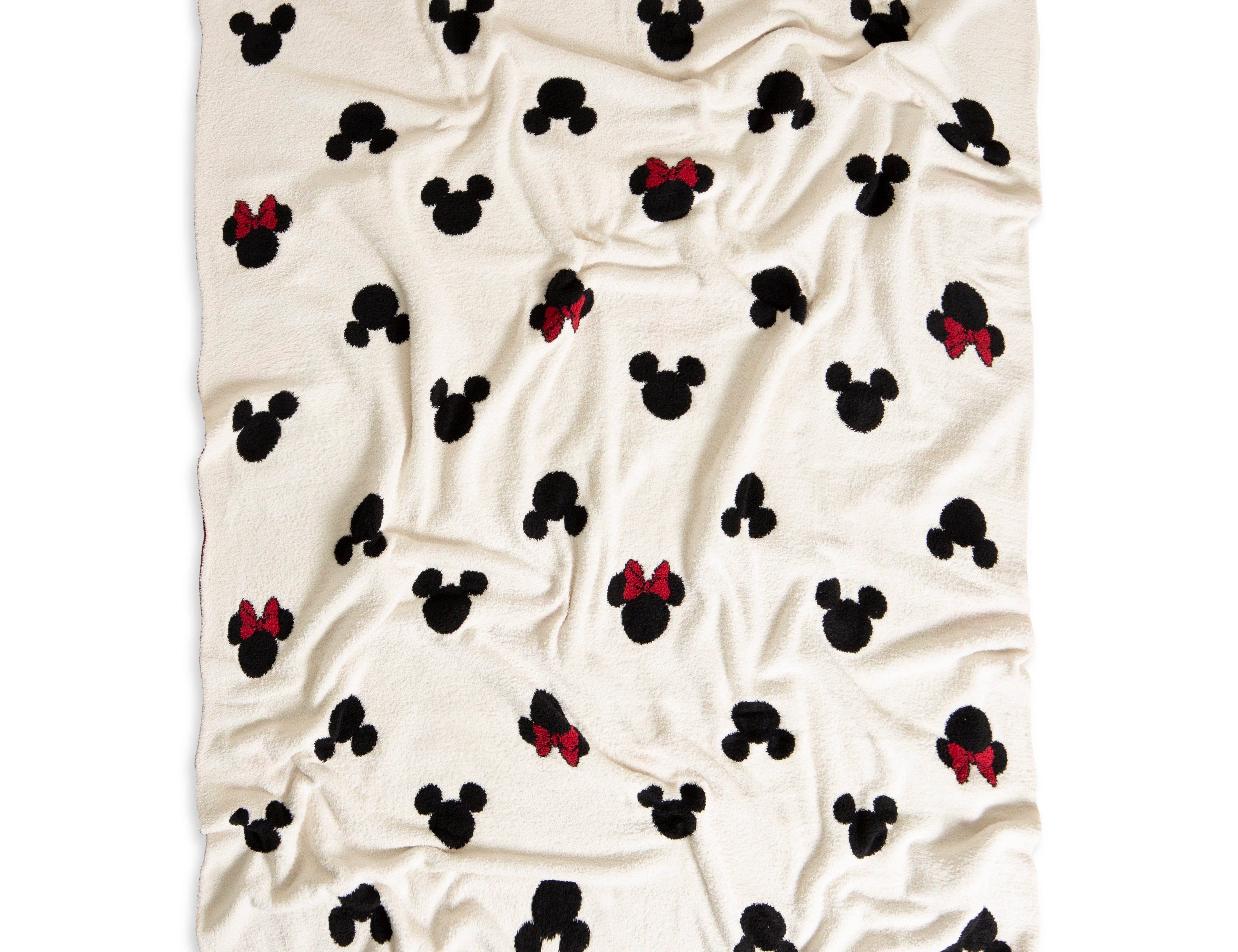 Barefoot Dreams Classic Disney Throw, a cream throw with black Mickey and red-bow Minnie icons