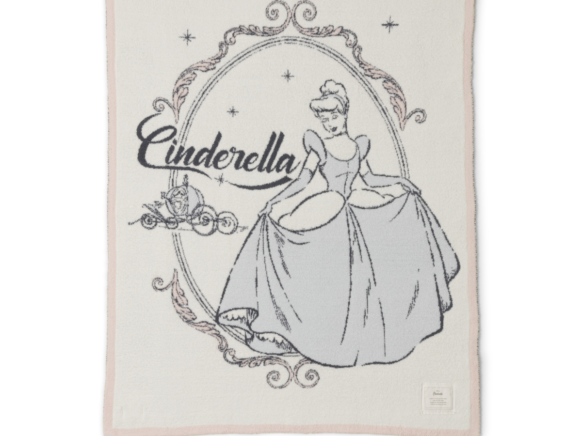 Barefoot Dreams Cozy Disney Princess Blanket in Cinderella, a cream knit blanket with a Cinderella design