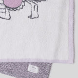 Close-up of the lavender knit and purple edge on the Barefoot Dreams Cozy Disney Princess Blanket in Rapunzel
