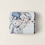 Barefoot Dreams Cozy Disney Princess Blanket in Snow White folded and tied with a Disney ribbon