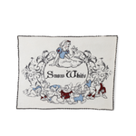 Barefoot Dreams Cozy Disney Princess Blanket in Snow White, a cream knit blanket with Snow White and the seven dwarfs