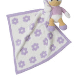 Barefoot Dreams Disney Blanket Buddie in Daisy Duck, plush Daisy on a purple daisy-print lovey blanket