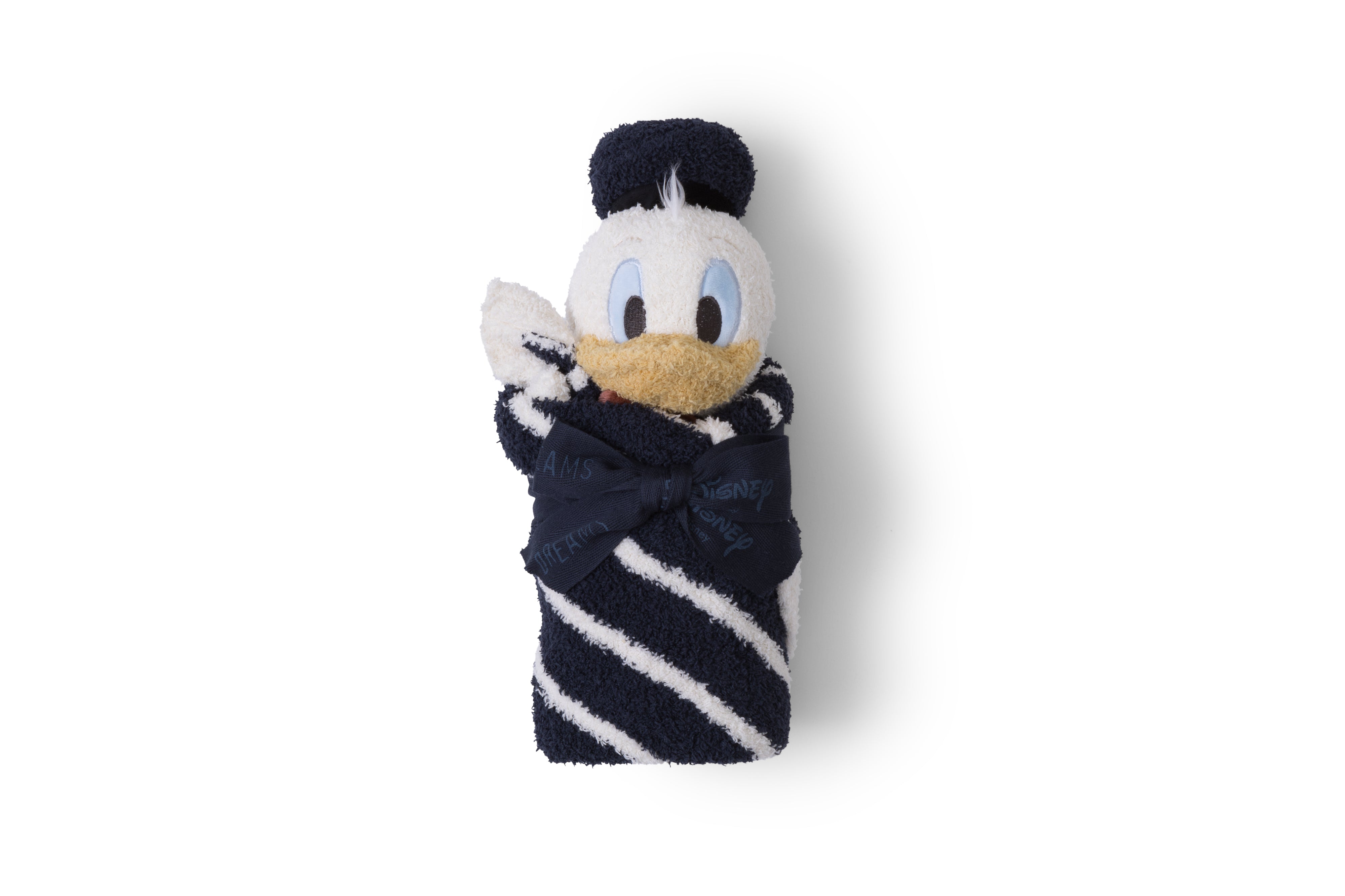 Barefoot Dreams Disney Blanket Buddie in Donald Duck rolled in a navy striped blanket, front view