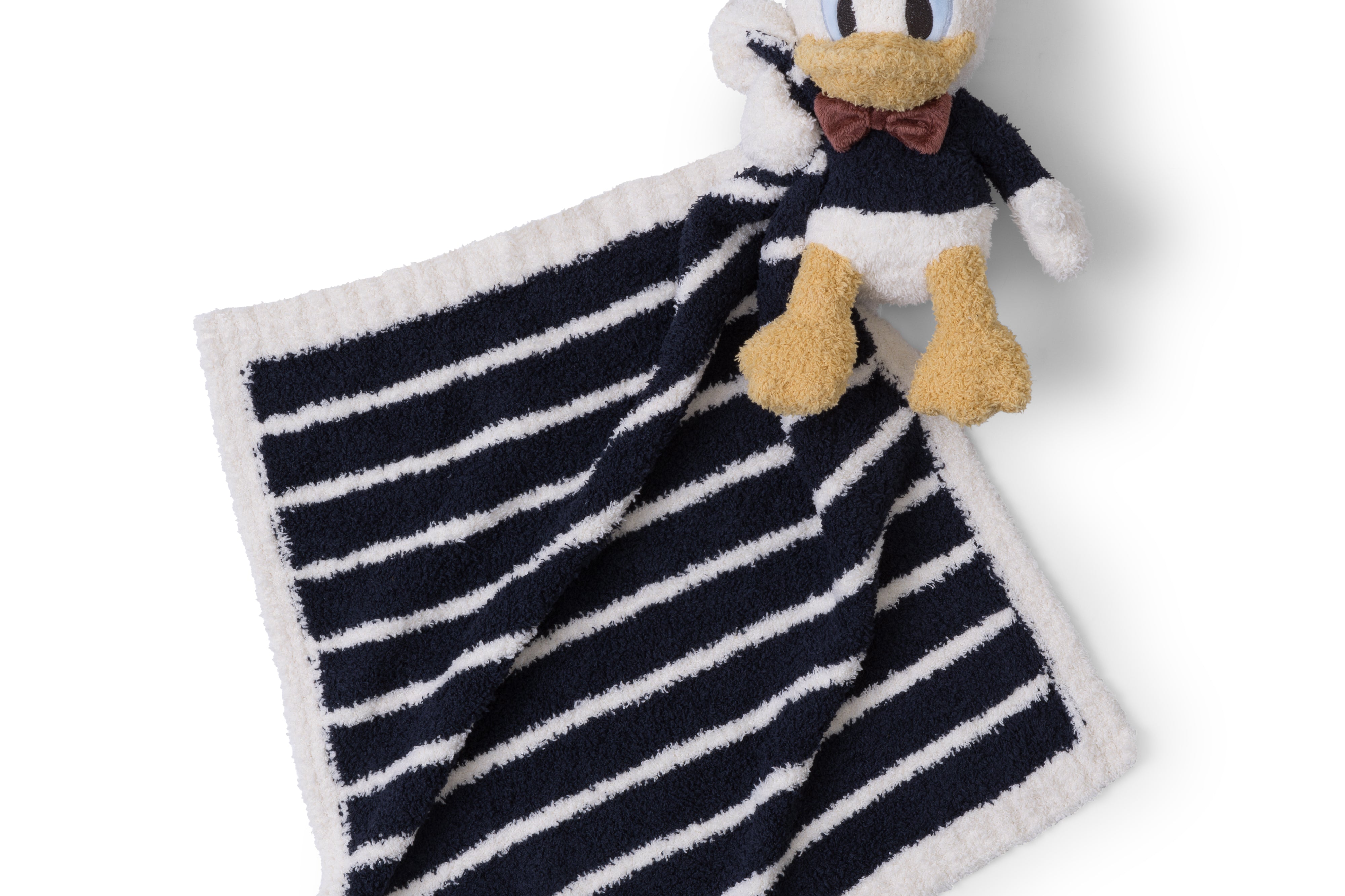 Barefoot Dreams Disney Blanket Buddie in Donald Duck, plush Donald on a navy and white striped lovey blanket