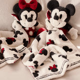Barefoot Dreams Disney Blanket Buddies in Mickey Mouse and Minnie Mouse side by side