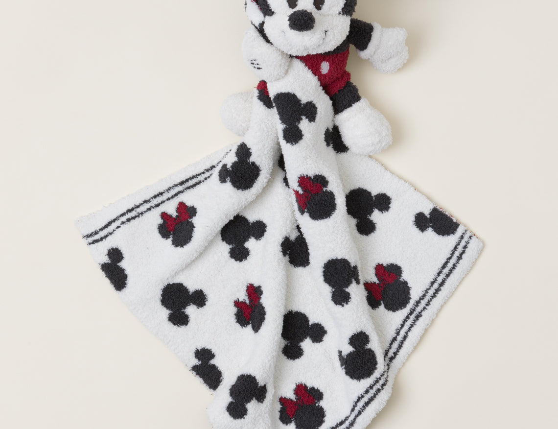 Barefoot Dreams Disney Blanket Buddie in Mickey Mouse, a knit Mickey plush on a Mickey-print lovey blanket