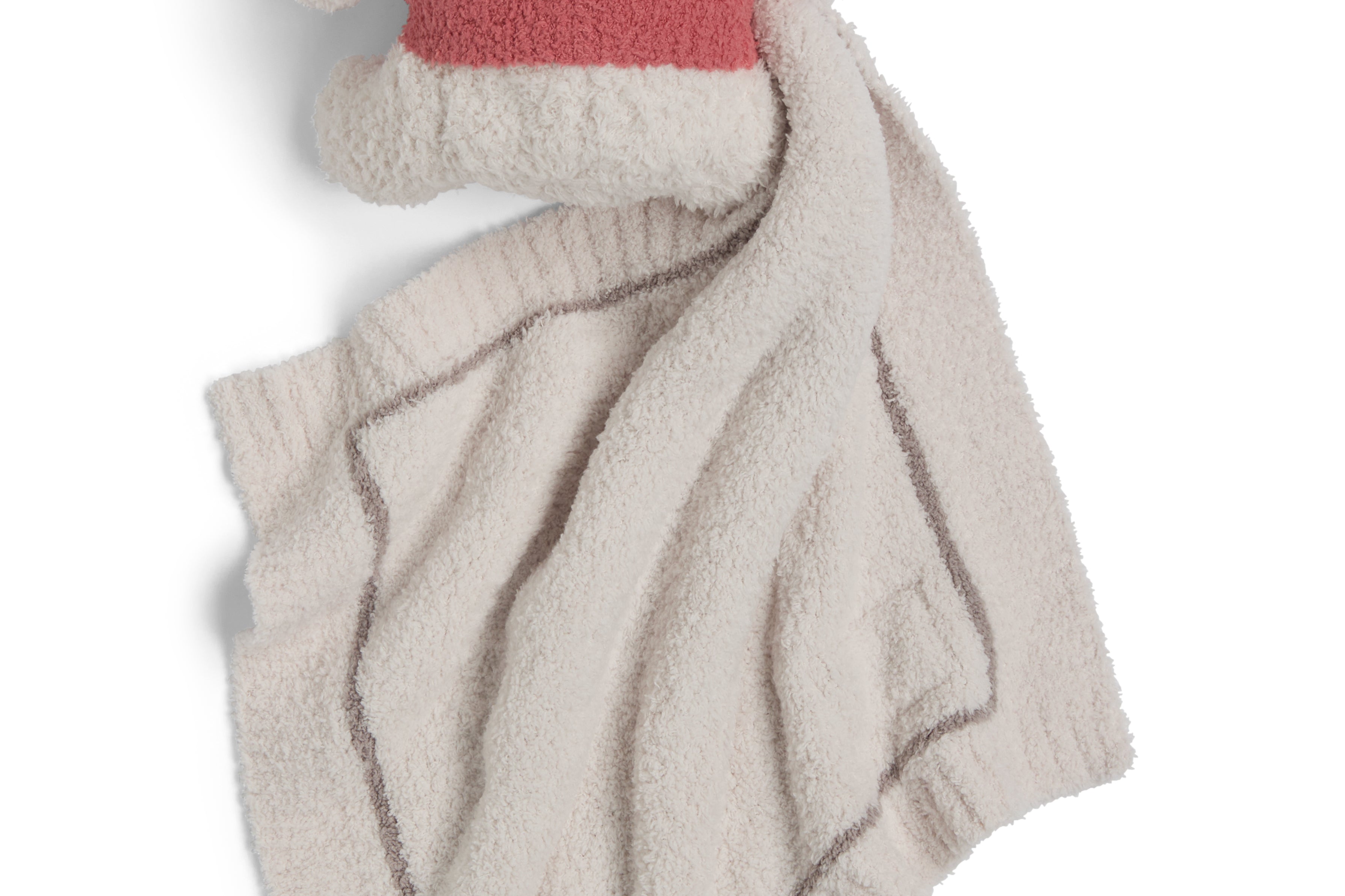 Barefoot Dreams Disney Blanket Buddie in Winnie the Pooh, back view of the plush on a tan lovey blanket